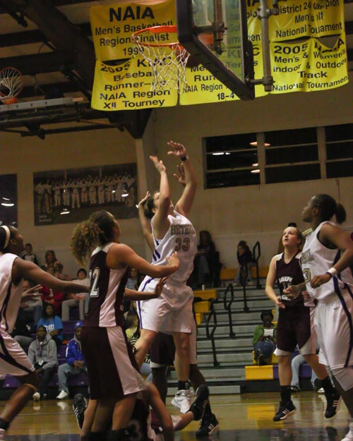 Bethel's #33 Nina Djokovic works hard in the paint against #RV Campbellsville University. She scored 18 in the contest.