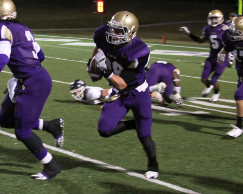 Bethel's Chancy DePriest returns an interception against Lambuth in the three overtime thriller.