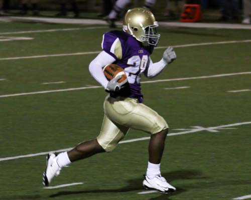 Bethel's DeMario Carter breaks into the open on an 85 yard kickoff return for a touchdown to open the game against KCU.