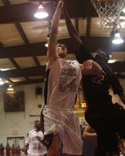 Alex Emelyanov works hard in the paint for two of his eight points against Union.