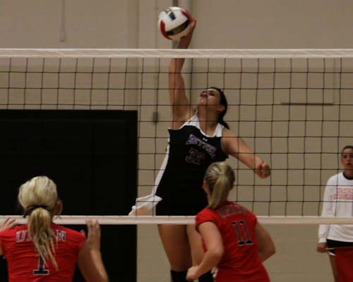 Adrianna Bookout-Gonzalez slams a kill against Union University