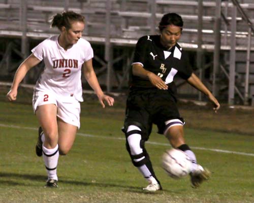 Marika Fukuta works the ball down the left side of the Union defense.  Fukuta scored what would be the winning goal.