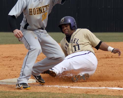 Johnathan Debbery swipes third against Harris Stowe. Deberry was 4 -7 with 4 RBI and 4 runs scored in the double header.