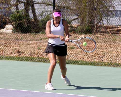 Bethel's Kim Lea Dinh had to battle back but won her #1 singles match after losing the first set 1-6; she won the next two