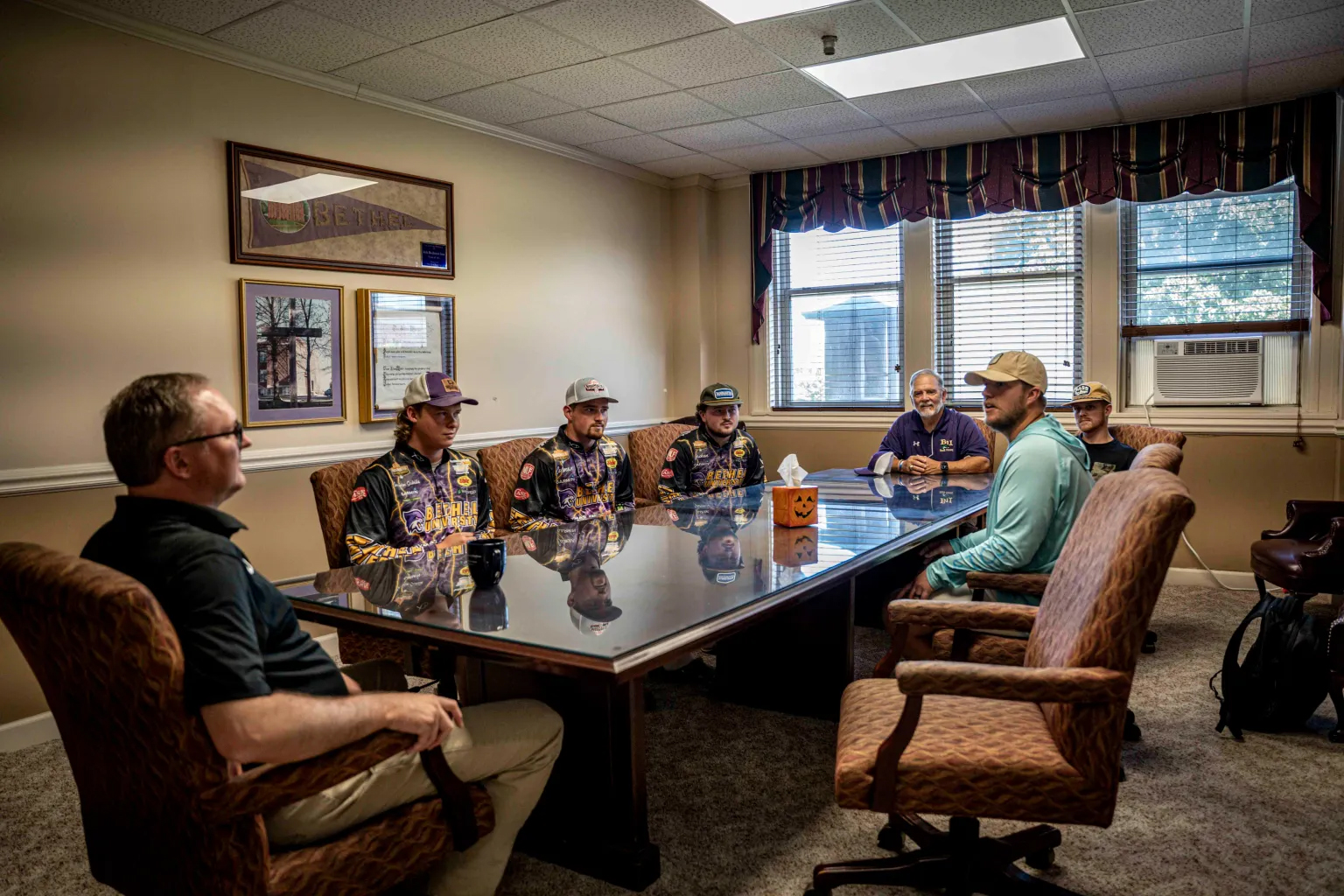 President Dr. Perry Moulds  Visits with the Bethel Bass Cat & Coach Garry Mason